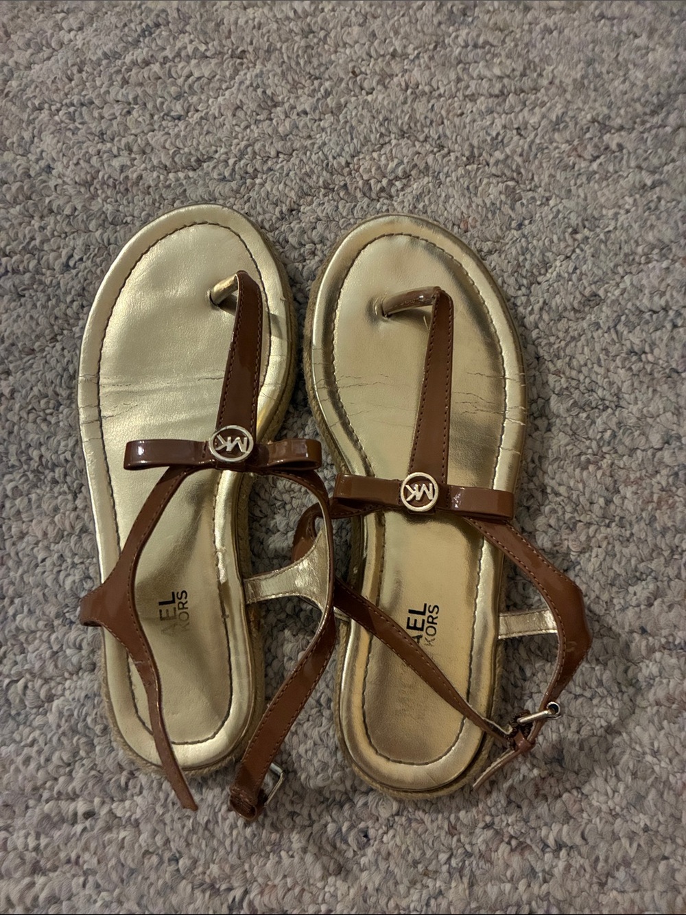 MICHAEL KORS Brown Patent Leather T-Strap Sandals with Gold Footbed